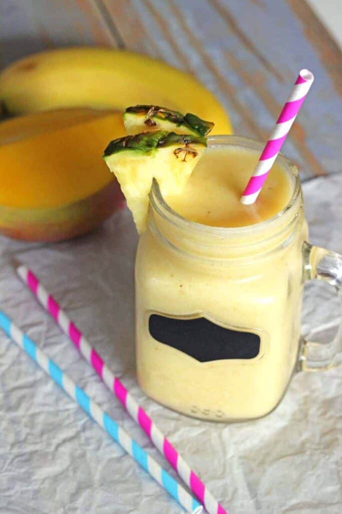 Tropical Fruit Smoothie | a summery smoothie that will take you straight to the tropics! Recipe at thekiwicountrygirl.com