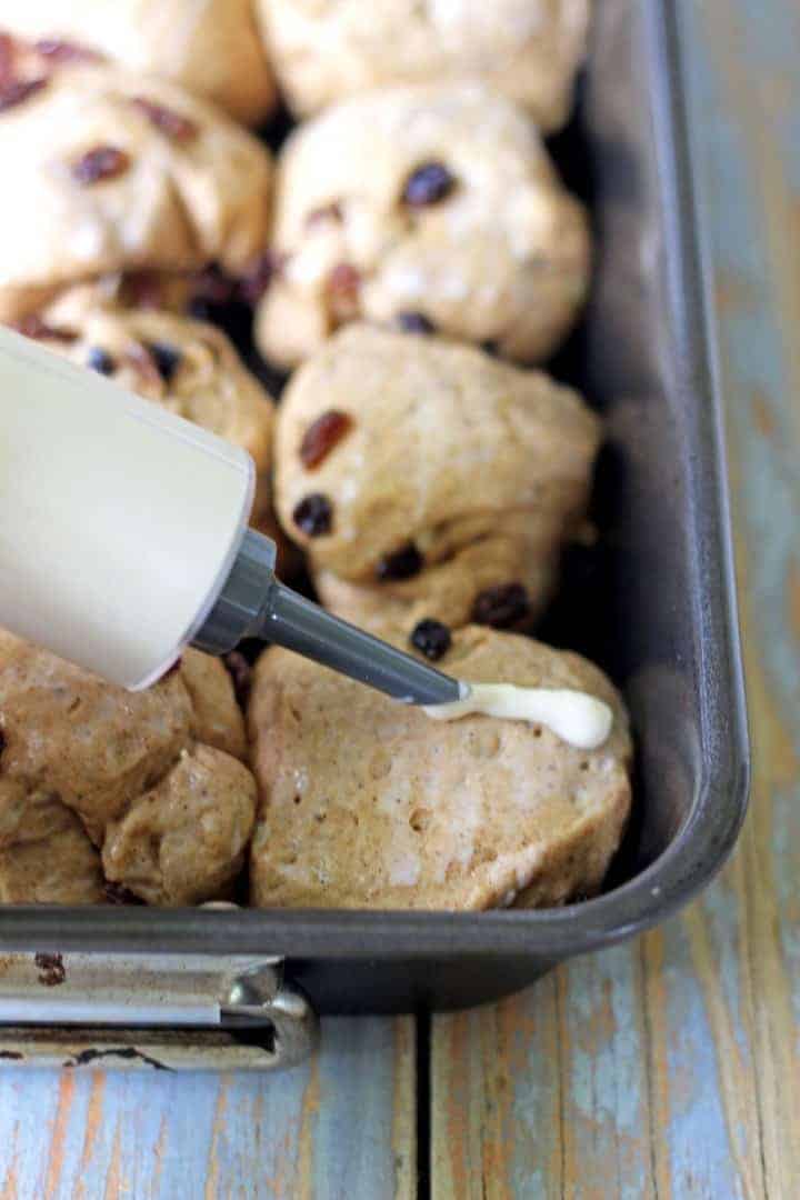 Delicious spiced hot cross buns packed full of fruity goodness - the best thing about Easter!