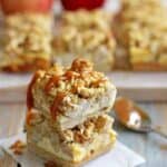 Buttery, spiced Apple Crumble Cheesecake Bars - the perfect autumn dessert and made even better drizzled with salted caramel sauce!