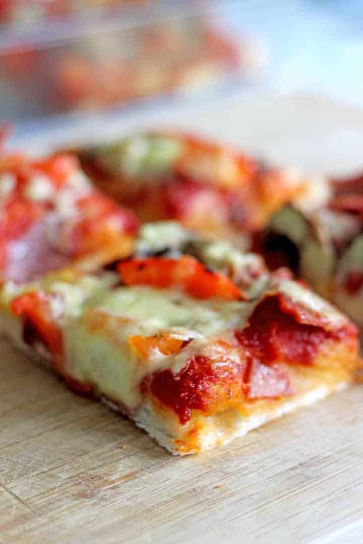 Thick and chewy pizza bread made with homemade pizza dough and all your favourite toppings!