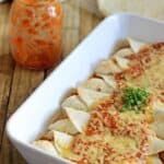 Slow Cooker Chicken Enchiladas with homemade enchilada sauce - the perfect fuss free, delicious Mexican dinner!