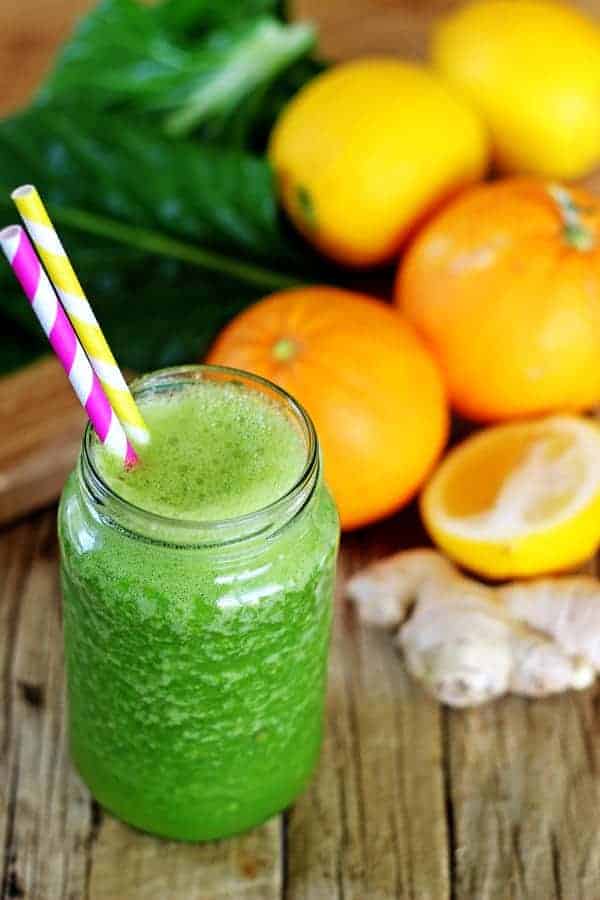 Beat the winter ills & chills with this cold fighting citrus green smoothie - oranges, lemon, ginger, pineapple & spinach make a delicious healthy smoothie | thekiwicountrygirl.com