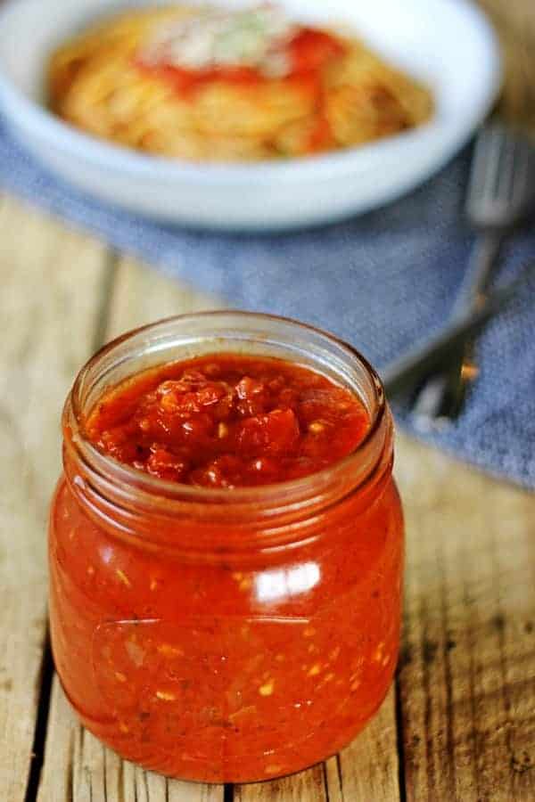 Homemade marinara sauce - the easiest way to make dinner on a Sunday. Throw the ingredients in a pot and simmer away. Simple, delicious & versatile! | thekiwicountrygirl.com