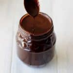 Homemade hot fudge sauce - the perfect thing to feed your ice-cream addiction, even in the middle of winter! Made from ingredients you have in your pantry! | thekiwicountrygirl.com