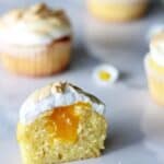 Lemon Meringue Cupcakes - light lemon cupcakes, filled with lemon curd & topped with meringue. They're the perfect spring dessert | thekiwicountrygirl.com