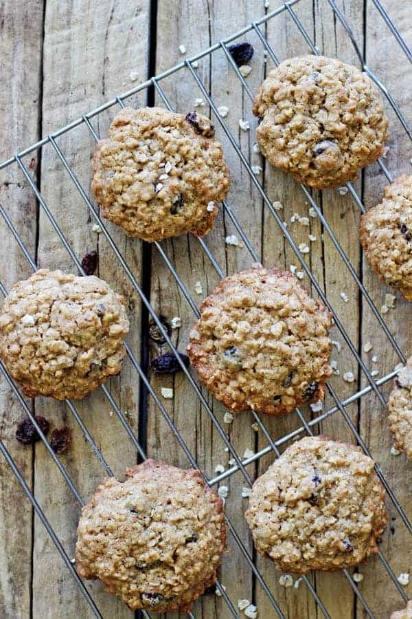 Soft, pillowy and easy to make classic oatmeal raisin cookies. A hint of cinnamon makes these cookies irresistible especially with a glass of cold milk! | thekiwicountrygirl.com