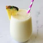 The best way to start getting excited for summer is with a pina colada smoothie - it's your favourite cocktail in healthy smoothie form! | thekiwicountrygirl.com