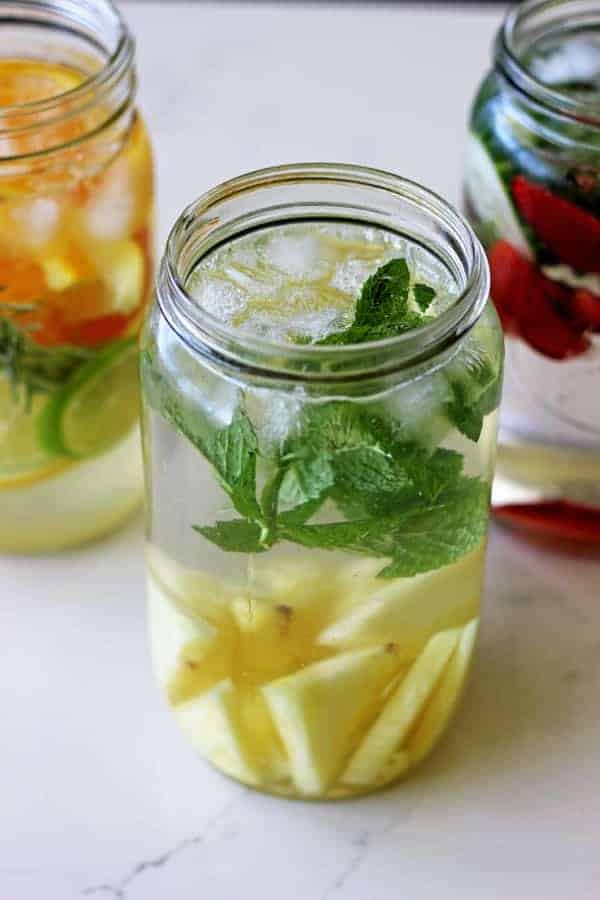 3 Fruit Flavoured Water Recipes - the perfect way to stay hydrated this summer with quick, easy and delicious fruit and herb flavoured water! | thekiwicountrygirl.com
