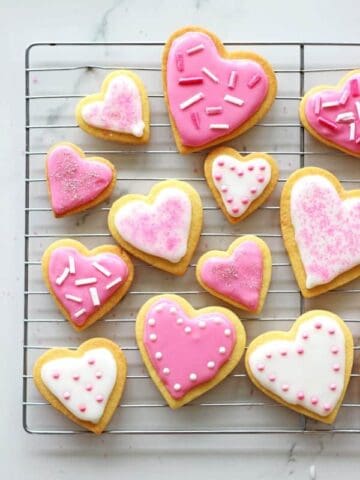 Valentine's Day Heart Sugar Cookies - the perfect cut out sugar cookies recipe and easy icing. Great for Valentine's Day, or any other day! | thekiwicountrygirl.com