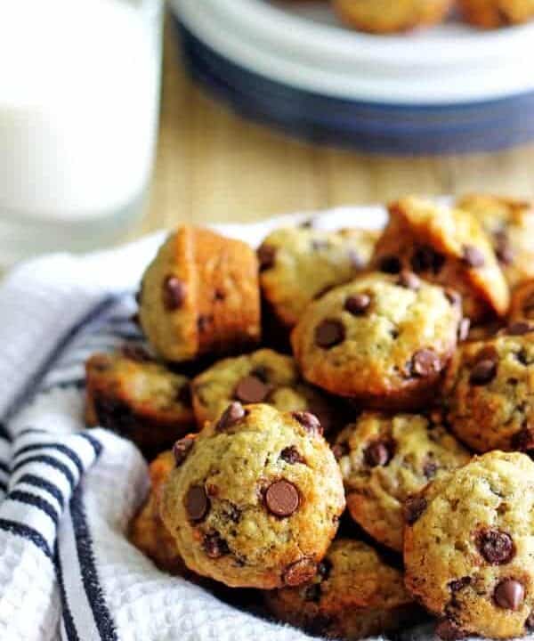 Mini Banana Chocolate Chip Muffins - perfect for lunchboxes and little hands, these mini muffins are packed full of banana chocolate goodness! | thekiwicountrygirl.com