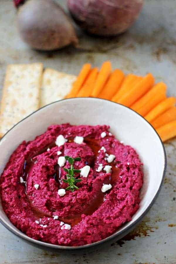Homemade beetroot hummus plus my secret for super smooth hummus - the easiest and most beautiful healthy snack around! Perfect for afternoon snacking | thekiwicountrygirl.com