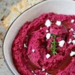 Homemade beetroot hummus plus my secret for super smooth hummus - the easiest and most beautiful healthy snack around! Perfect for afternoon snacking | thekiwicountrygirl.com