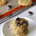 The perfect combination of cookies and cheesecake, rolled into a super quick recipe - Oreo Cheesecake Cookies with delicious cream cheese & chunks of Oreos! | thekiwicountrygirl.com