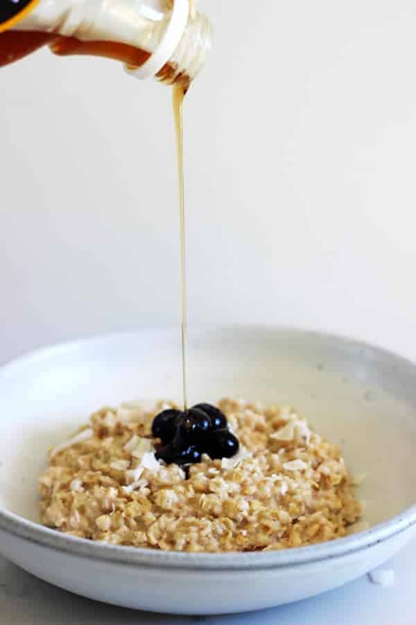 Coconut oatmeal - the perfect transitional breakfast from winter to summer. Tropical but still warm & cosy with lots of coconut flavour! | thekiwicountrygirl.com