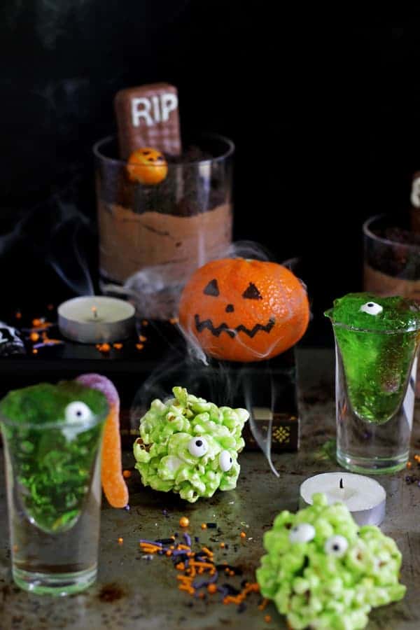 5 Quick and Easy Halloween Treats - jelly slime shots, monster popcorn slime balls, oreo graveyard cups, mandarin pumpkins & Halloween bark! | thekiwicountrygirl.com