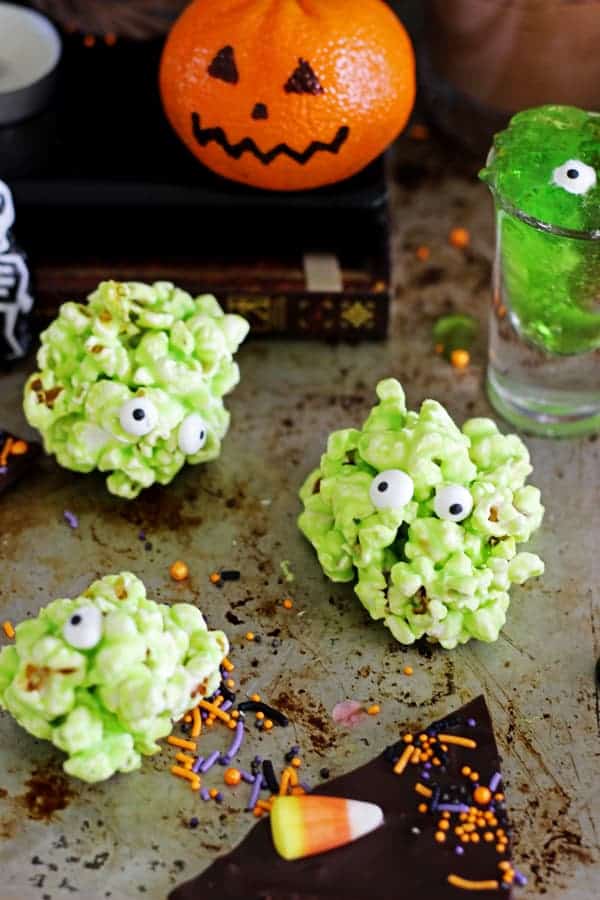 5 Quick and Easy Halloween Treats - jelly slime shots, monster popcorn slime balls, oreo graveyard cups, mandarin pumpkins & Halloween bark! | thekiwicountrygirl.com
