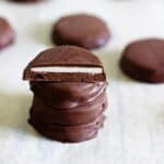 Homemade Mint Slices - New Zealand's favourite biscuit made at home! Crispy chocolate biscuits topped with peppermint fondant and coated in chocolate. | thekiwicountrygirl.com