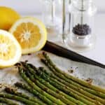 Lemon roasted asparagus - the perfect quick & easy side dish for early summer BBQ's. Ready in 20 minutes it's fresh, lemony and tastes like spring! | thekiwicountrygirl.com
