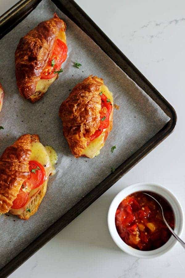 The easiest and tastiest 15 Minute Ham, Cheese & Tomato Croissants - they come together and are ready to eat in only 15 minutes! Perfect for Easter brunch or just any old weekend breakfast! | thekiwicountrygirl.com
