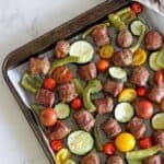 Sheet Pan Sausage & Veggies with Satay Sauce - a quick, easy and super tasty sheet pan dinner with colourful veggies, tasty sausages and a killer satay sauce! Great for weeknights and meal prep | thekiwicountrygirl.com