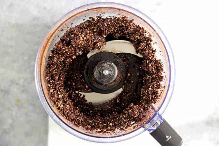 Food processor with base for mocha energy bites in it, blitzed together