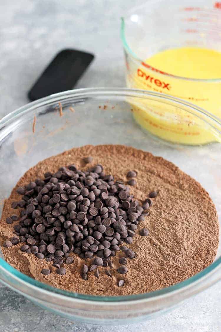 Mixing bowls with ingredients for double chocolate muffins