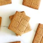 Homemade graham crackers on white marble background