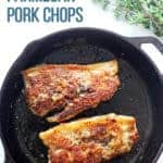 Parmesan pork chops cooking in a cast iron frying pan