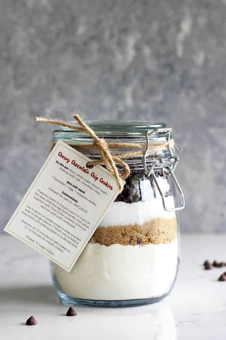 Jar of homemade chocolate chip cookie mix with a label for a homemade gift idea