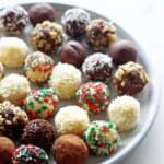Plate full of dark, milk and white chocolate truffles