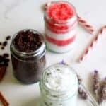 Jars of homemade sugar scrubs - coffee, peppermint and lavender