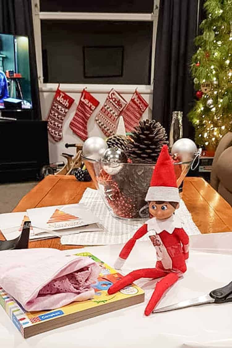 Elf on the shelf wrapping presents