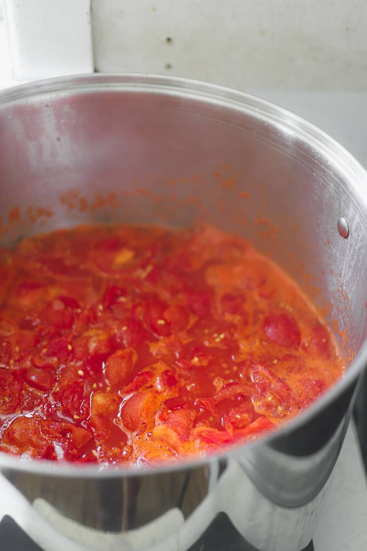 Tomato sauce cooking in stockpot