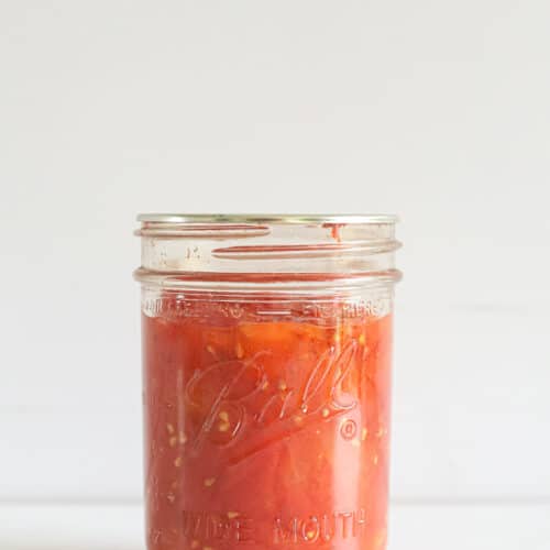 Pint preserving jar with diced tomatoes