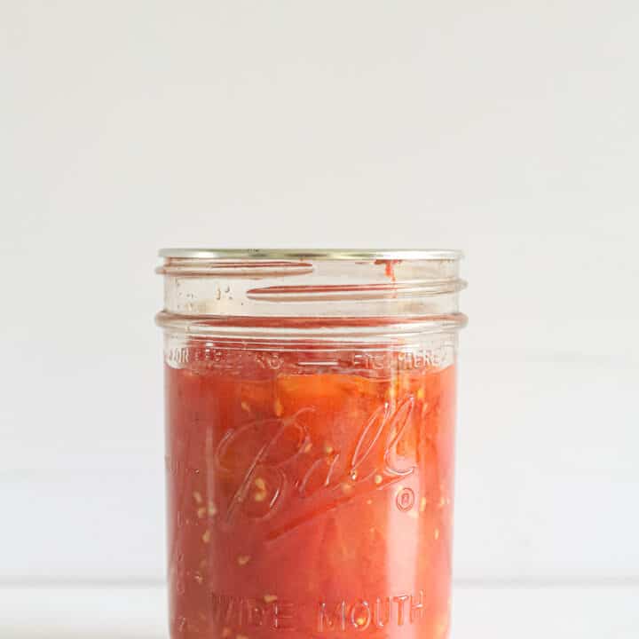 Pint preserving jar with diced tomatoes