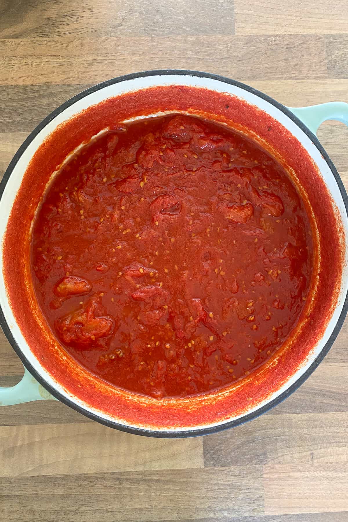 Large pot with cooked tomatoes