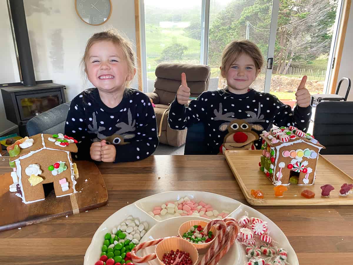 Children with decorated gingerbread houses